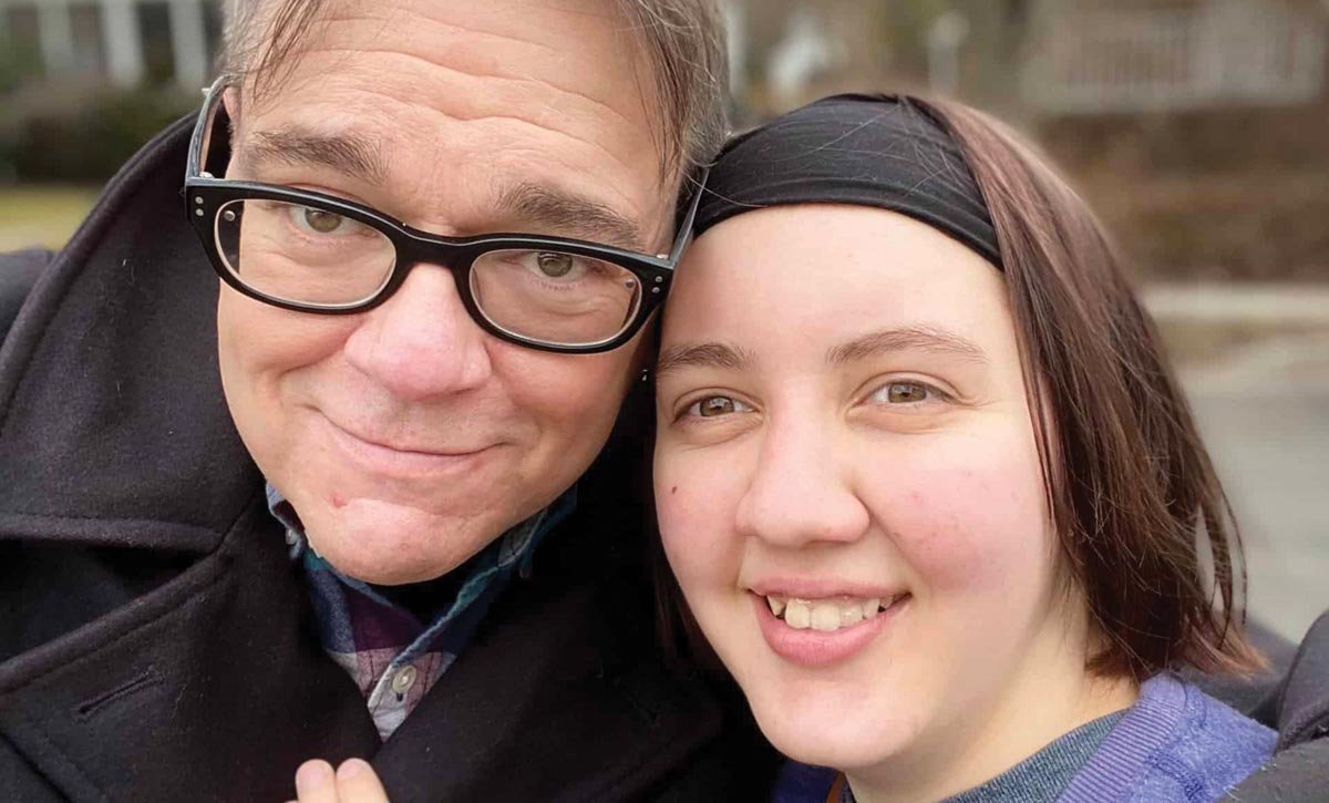 Dad with daughter close up.